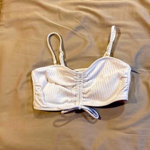 White crop top it’s a size small don’t know the brand